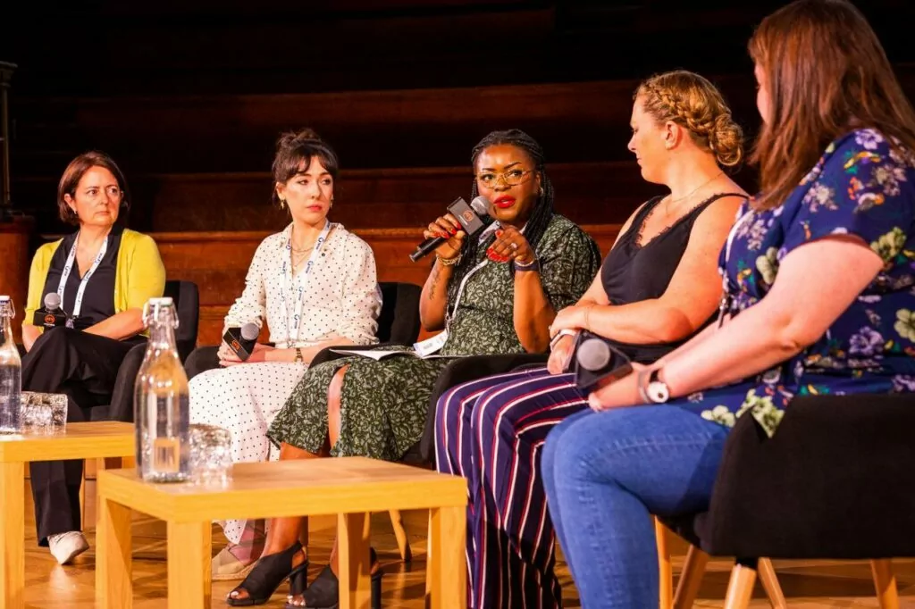 Women speaking in panel